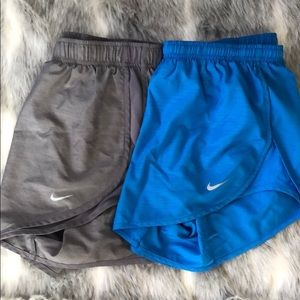 Gray and blue Nike running shorts